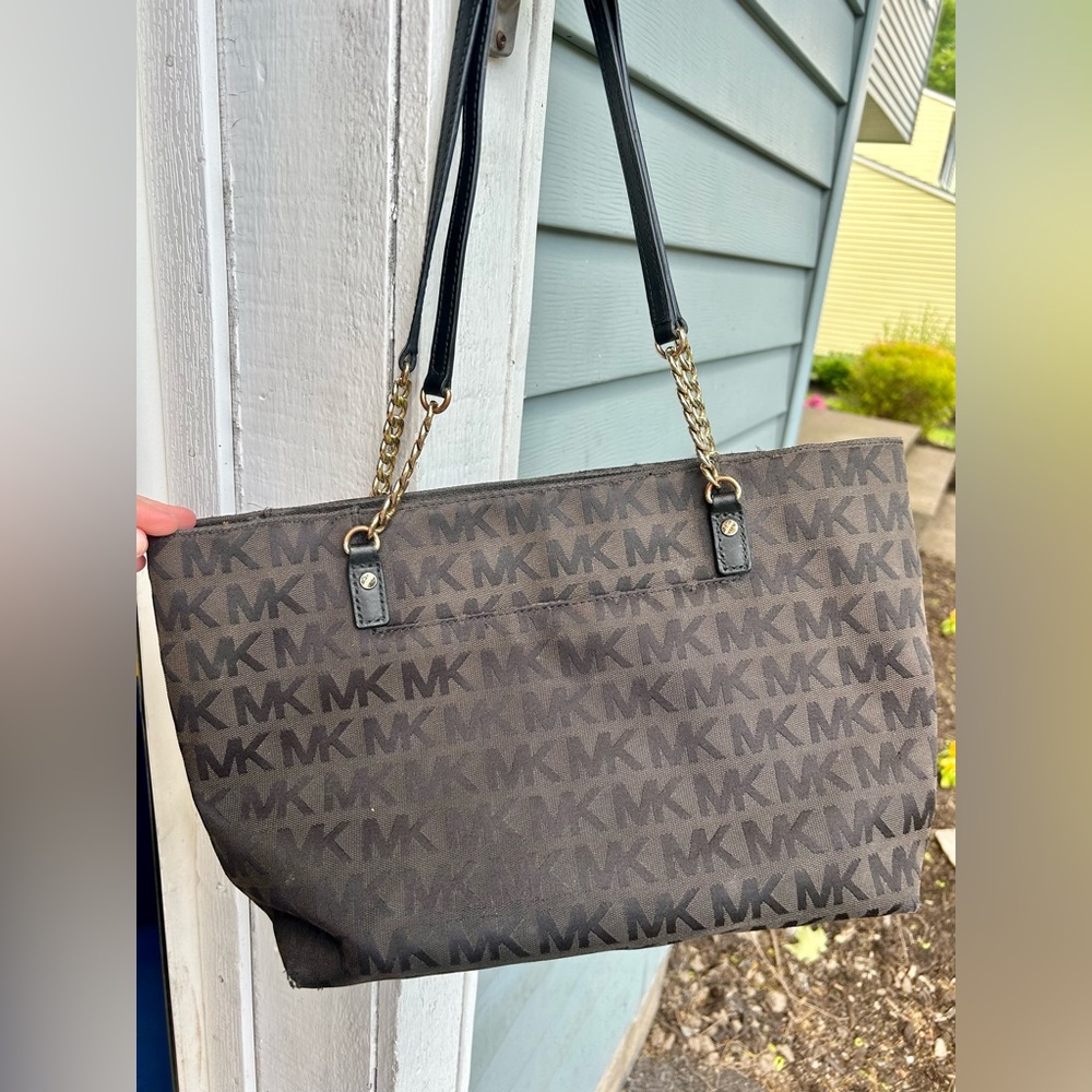 Black Michael Kors shoulder purse.